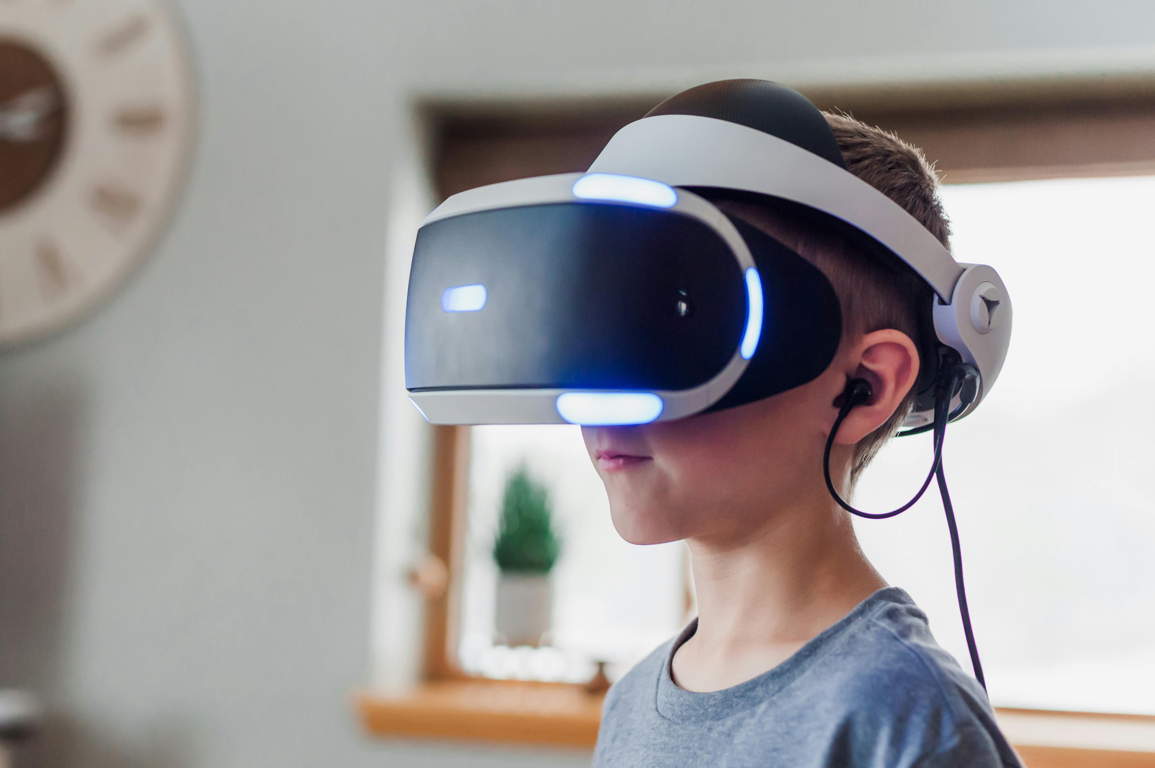 Children engaging with game-based and VR learning in after-school care
